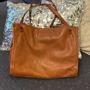 American leather co women’s tote, with 3 compartments , outside zipper pocket.